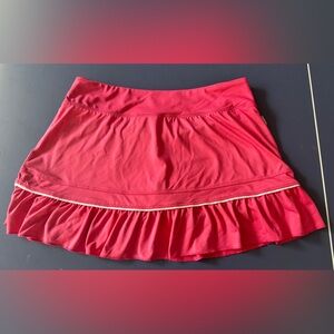 Nike dark pink tennis Skirt with Ruffled Hem, built in shorts